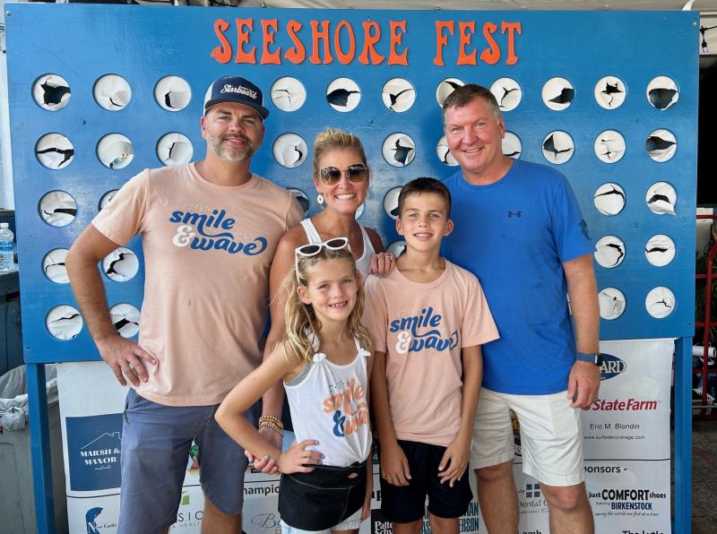 SeeShore Fest is taking over The Starboard Saturday, Aug. 24. The ninth annual fundraiser was founded by the Napoliitano family of Rehoboth to raise awareness and fight sight loss. To date, the event has raised $135,958 for the Foundation Fighting Blindness and The Eye Institute. Gathered at SeeShore Fest 2023 are in back (l-r) Dom and Heather Napolitano and The Starboard owner Steve “Monty” Montgomery. In front are Laityn and Dax Napolitano. ELLEN DRISCOLL PHOTO